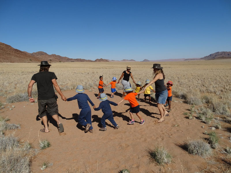 Kids playing in desert